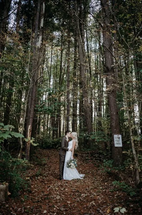 forest wedding vibes with a kiss at our ohio wedding venue