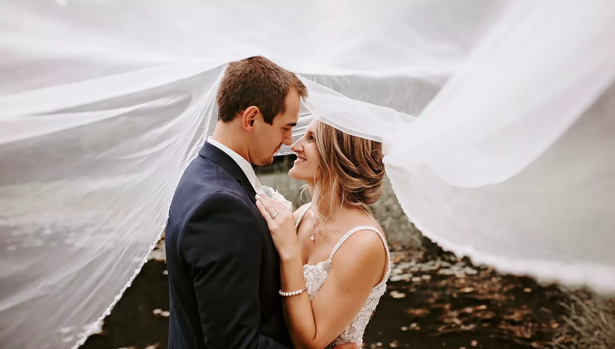 jess and paul with bridal veil