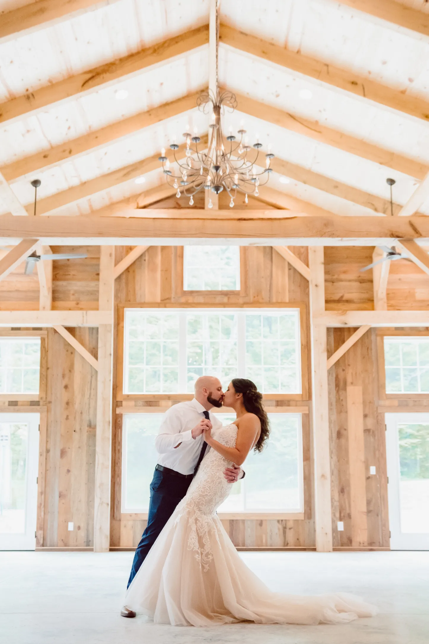 kiss inside underneath the chandelier